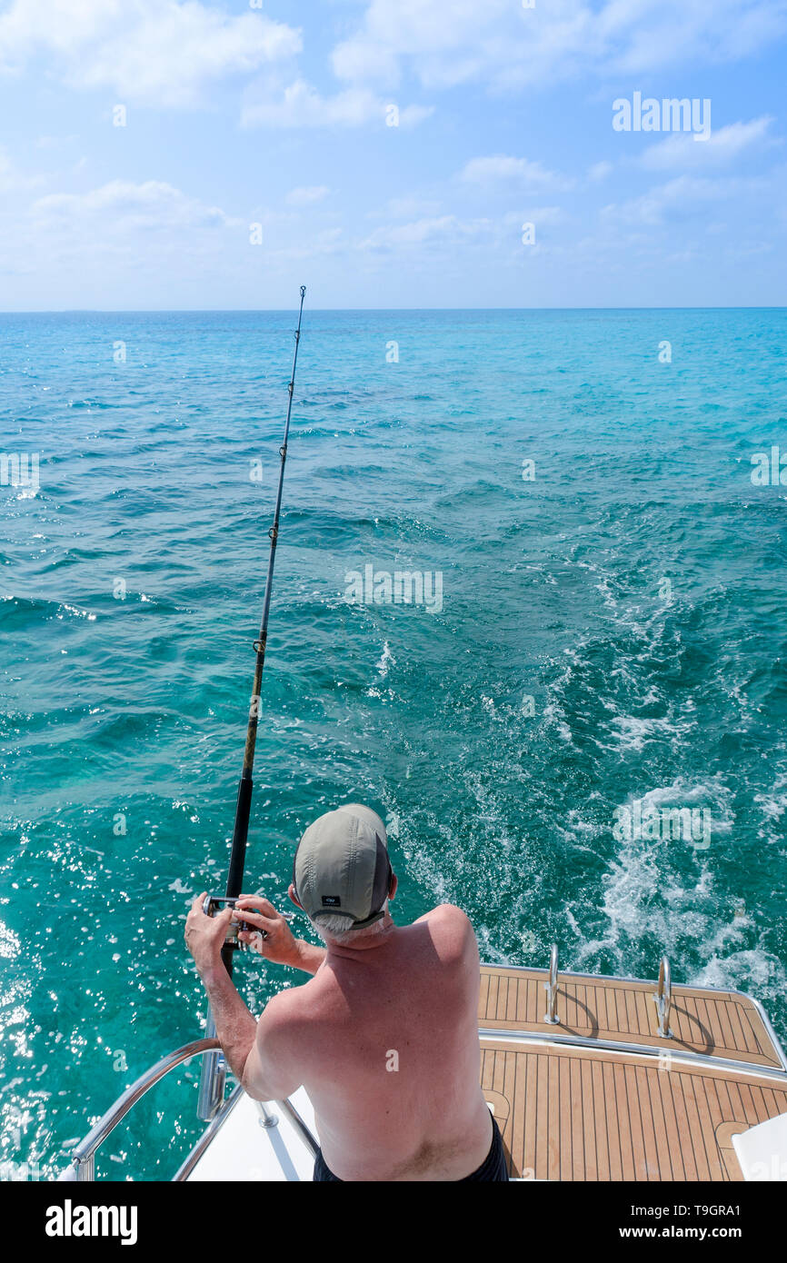 Fishing inside the Belize Barrier Reef,  a series of coral reefs straddling the coast of Belize Stock Photo