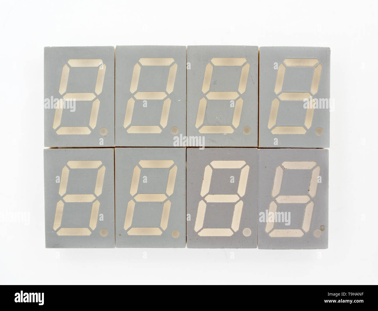One digit seven segments led display. Eight pieces. White background. Stock Photo