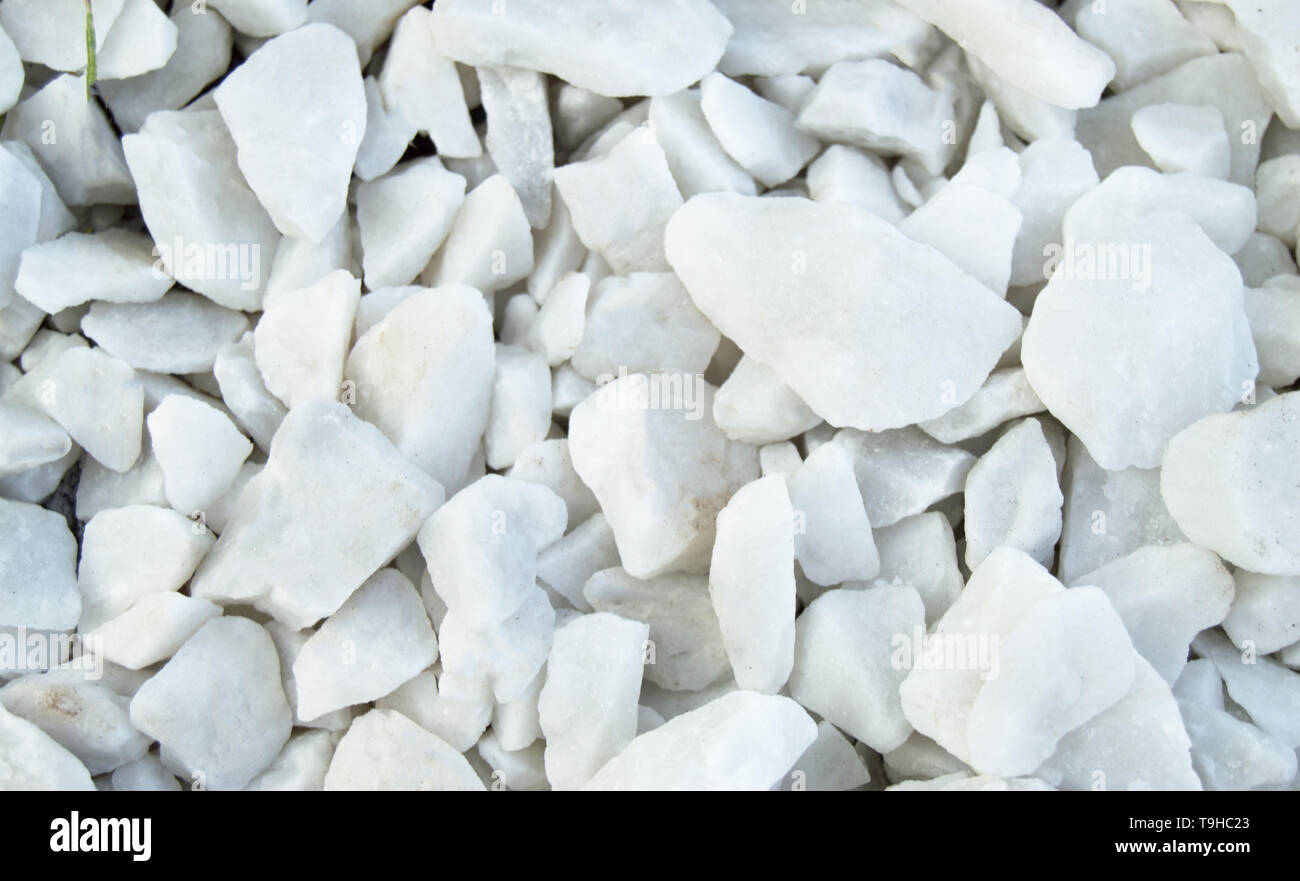 Background natural material white pebbles, gravel, stones for laying