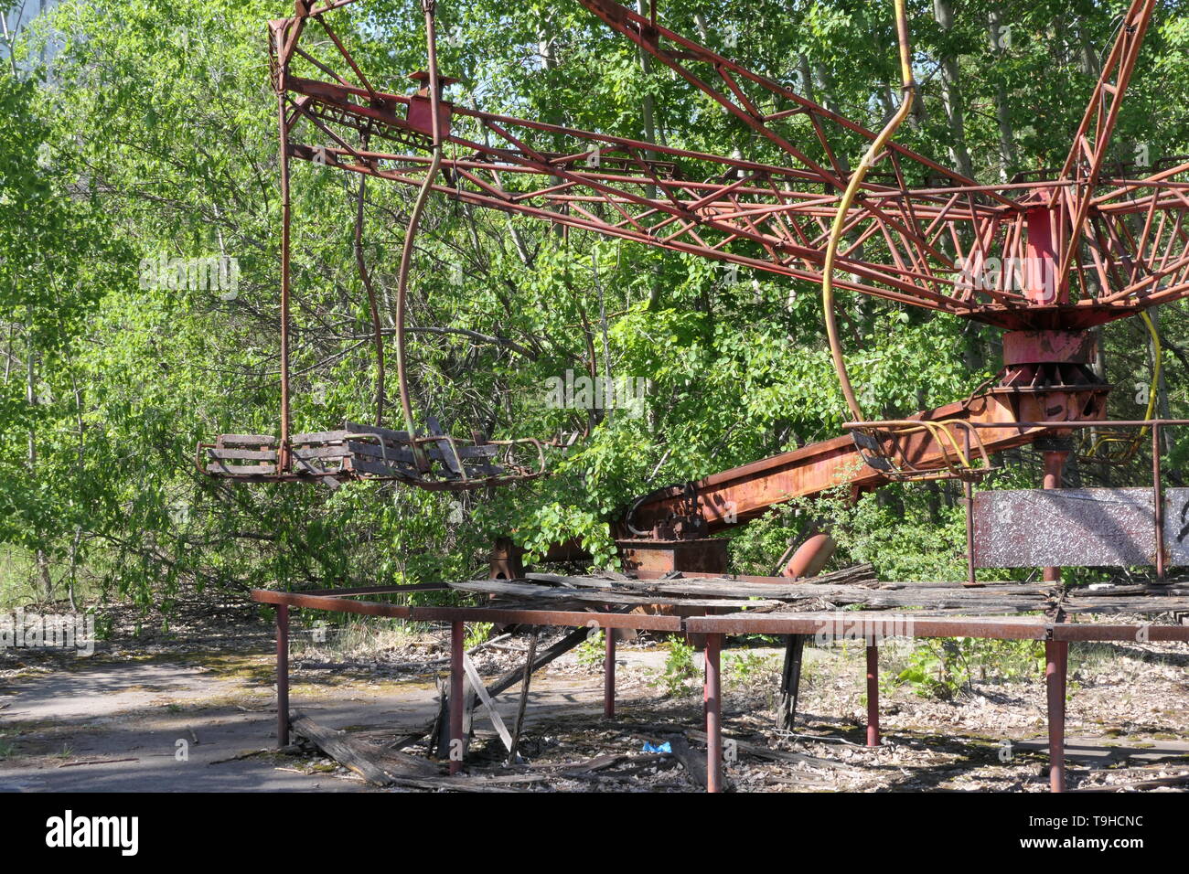 Abandoned carousel in the amusement park near the ghost town of Pripyat, Chernobyl exclusion zone, Ukraine Stock Photo