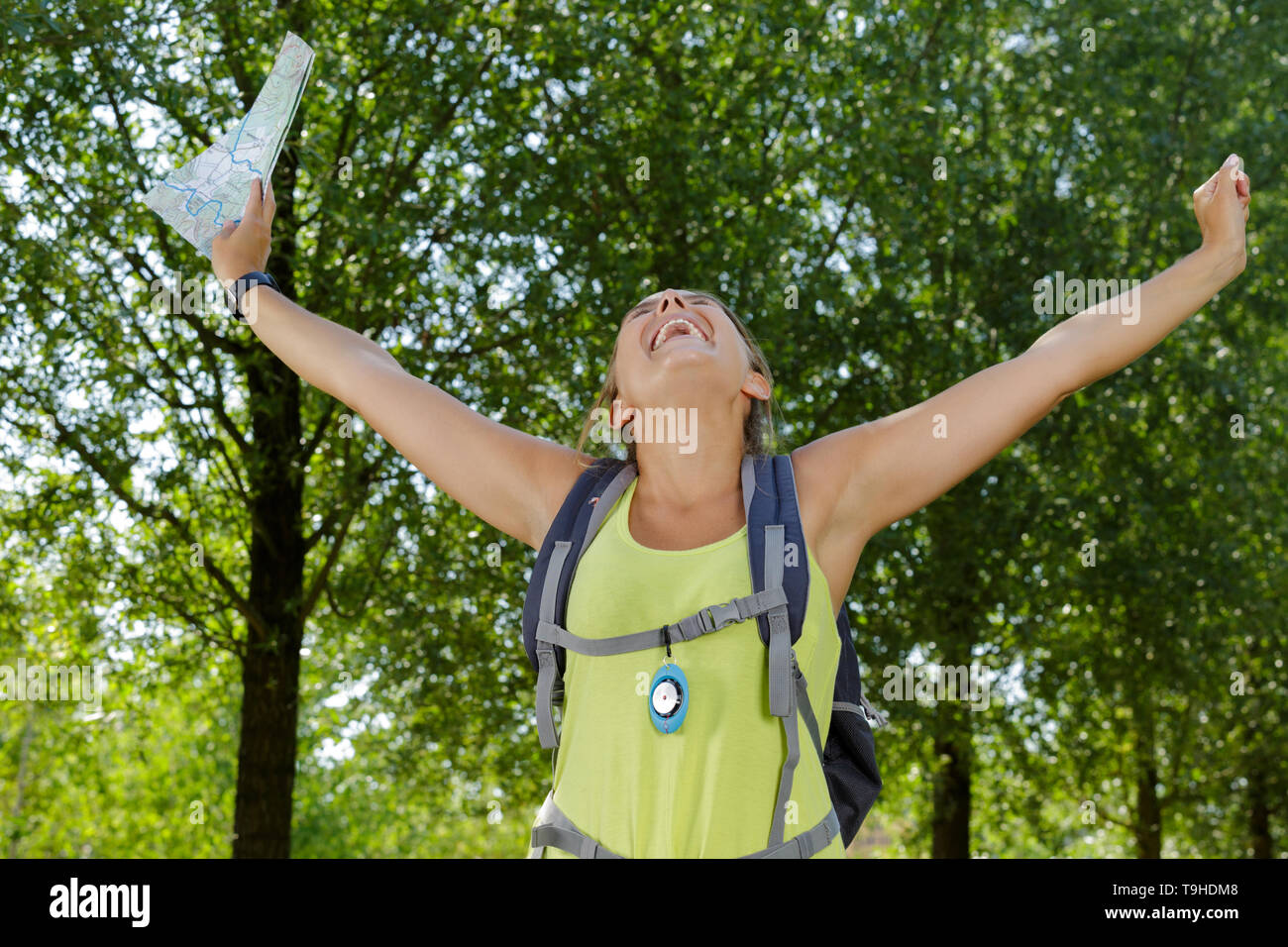 Woman successful hiker climbing hi-res stock photography and images - Alamy