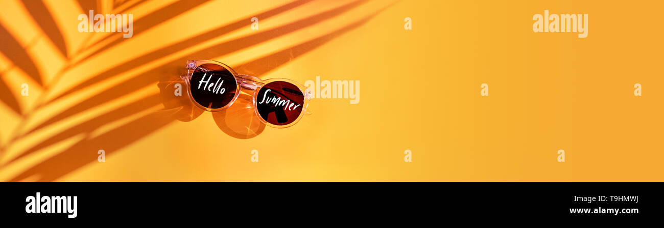 Hello Summer Word On Palm Leaf Shadow With Summer Sunglasses On