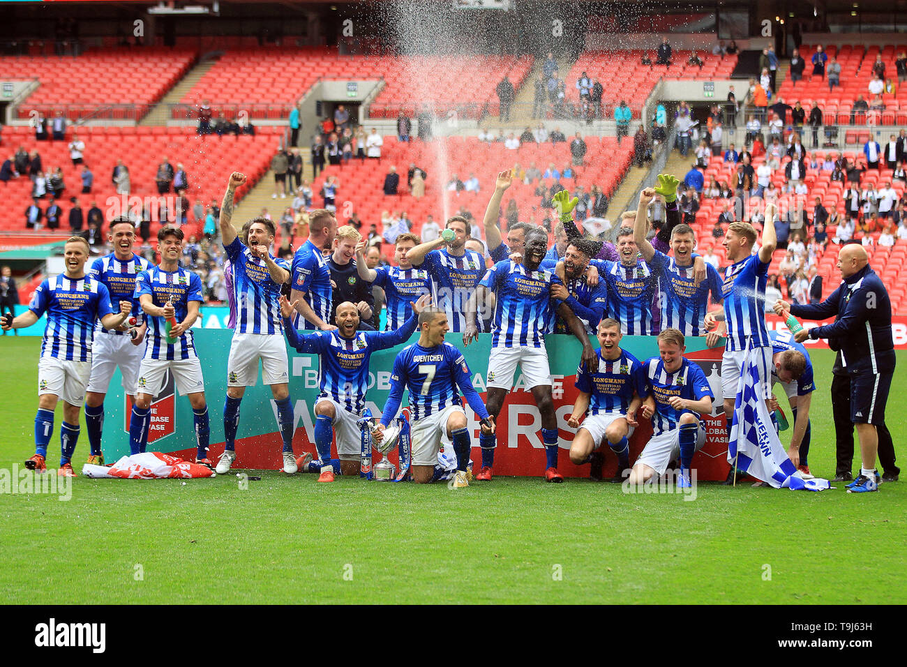 London, UK. 19th May, 2019. Chertsey Town players celebrate their FA Vase  Trophy victory. The FA Vase trophy final, Chertsey Town FC v Cray Valley at  Wembley Stadium in London on Sunday