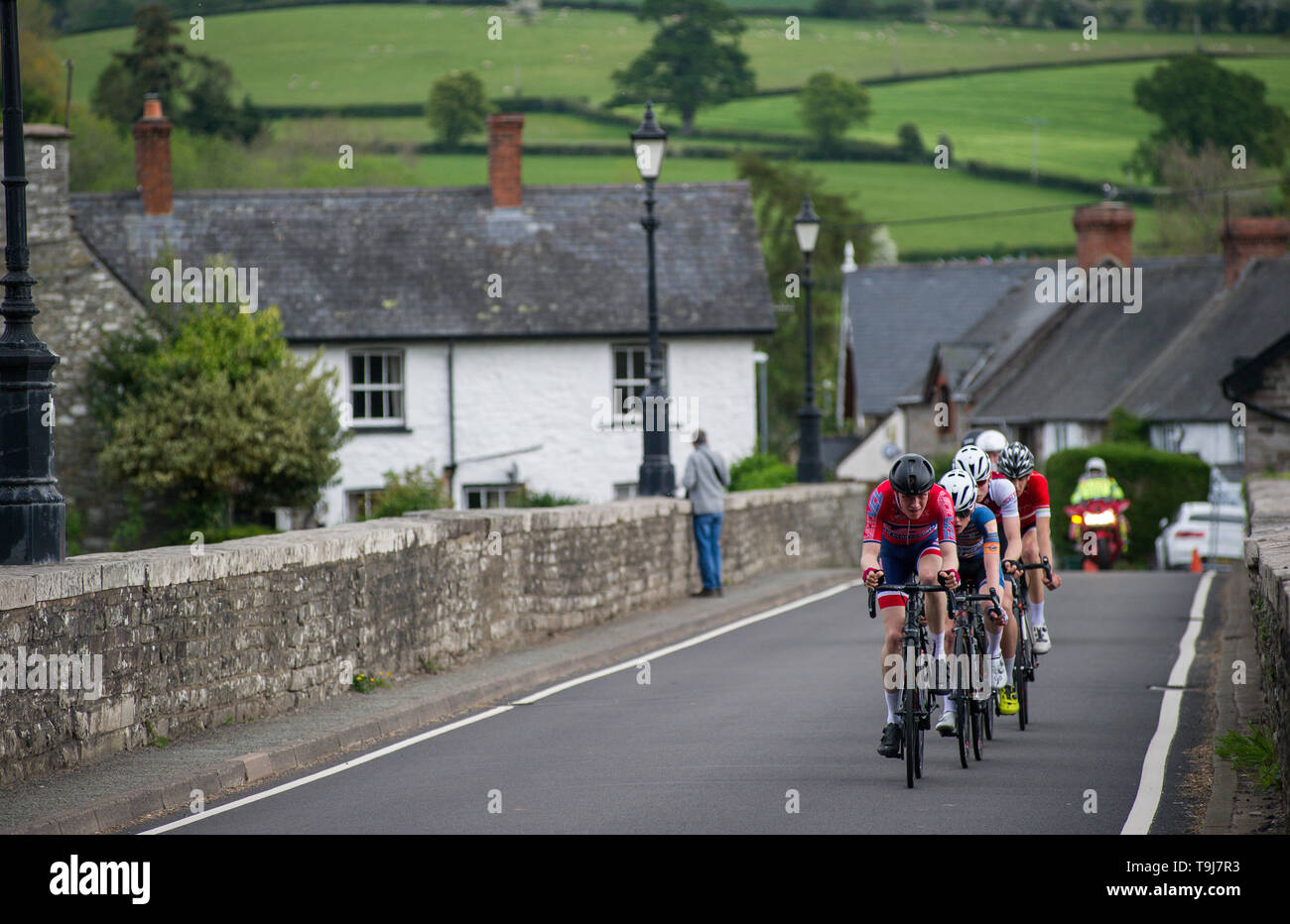 Brecon, Powys, Wales, UK.  19th May 2019. Thomas Gloag VC Londres leads a breakaway group across the Llyswen Bridge during the Cadence Junior Road Race part of the British Cycling National Junior Road Race Series.  Credit: David Partridge/Alamy Live News Stock Photo