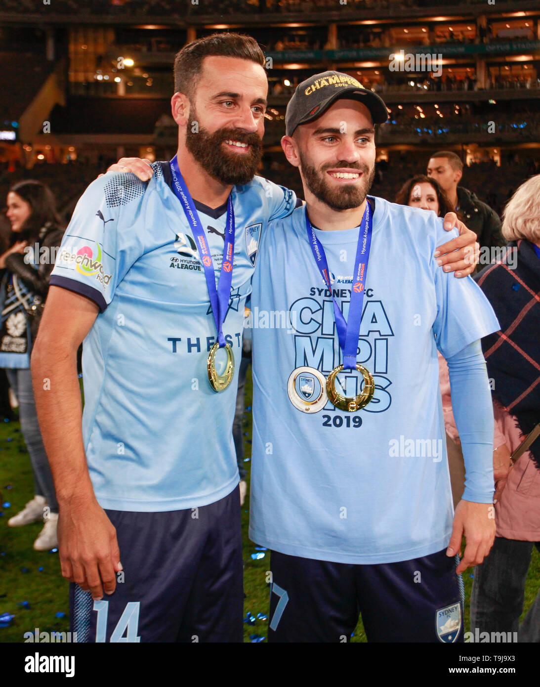 Perth Stadium, Perth, Australia. 19th May, 2019. A-League grand final, Perth Glory versus Sydney FC; Alex Brusque and Anthony Careers of Sydney FC pose with their winners medallions after winning the match against Perth Glory 4-1 in penalties Credit: Action Plus Sports/Alamy Live News Stock Photo