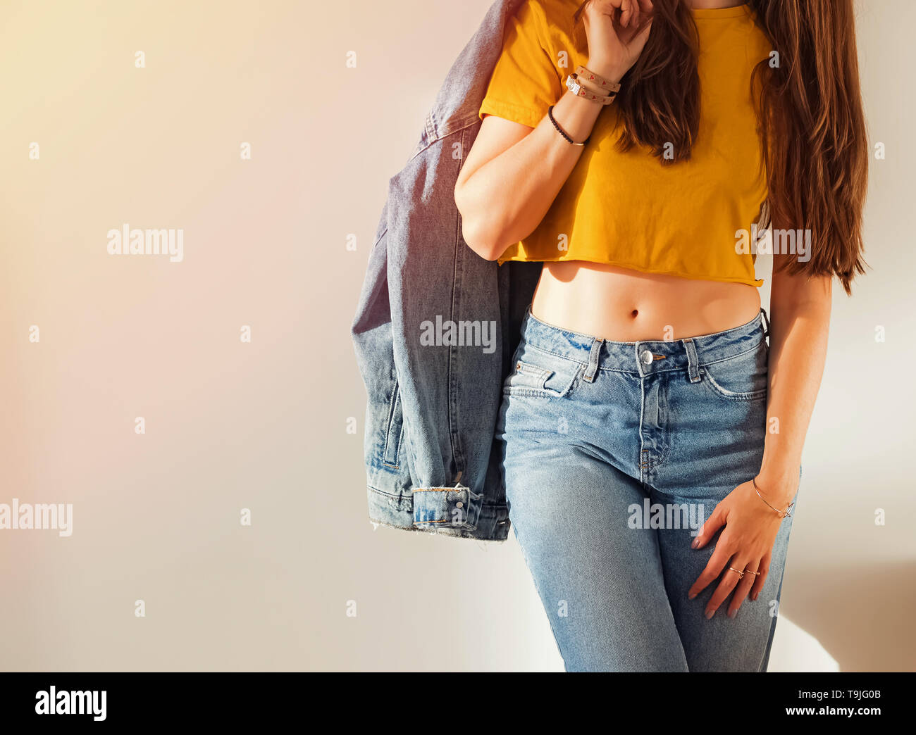 yellow t shirt with jeans