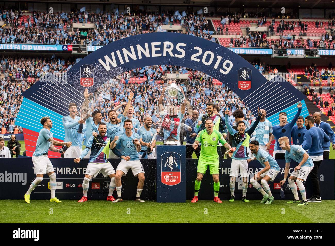 LONDON, ENGLAND - MAY 18: Manchester City players Kevin de Bruyne, Ederson, Bernardo Silva, David Silva, Gabriel Jesus, Ilkay Gundogan, Kyle Walker, Vincent Kompany and Sergio Aguero celebrate during the FA Cup Final match between Manchester City and Watford at Wembley Stadium on May 18, 2019 in London, England. (Photo by Sebastian Frej/MB Media) Stock Photo