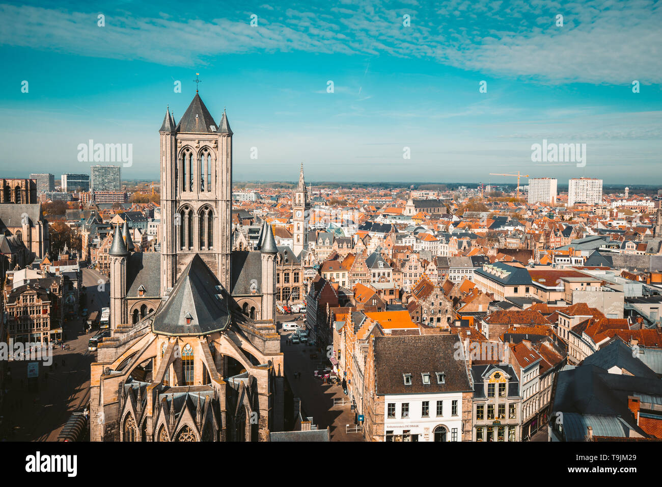 Aerial panoramic view of the historic city of Ghent on a beautiful sunny day with blue sky and clouds in summer, province of East Flanders, Belgium Stock Photo