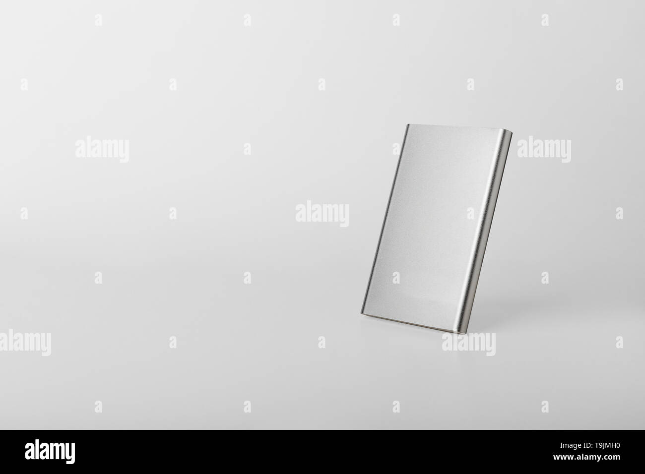 Device for charging electronic devices. External battery. Stock Photo