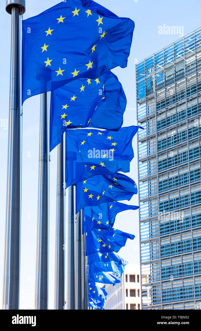 European union flags EU flags outside the EU commission building european commission building Berlaymont building, Brussels, Belgium, EU, Europe Stock Photo