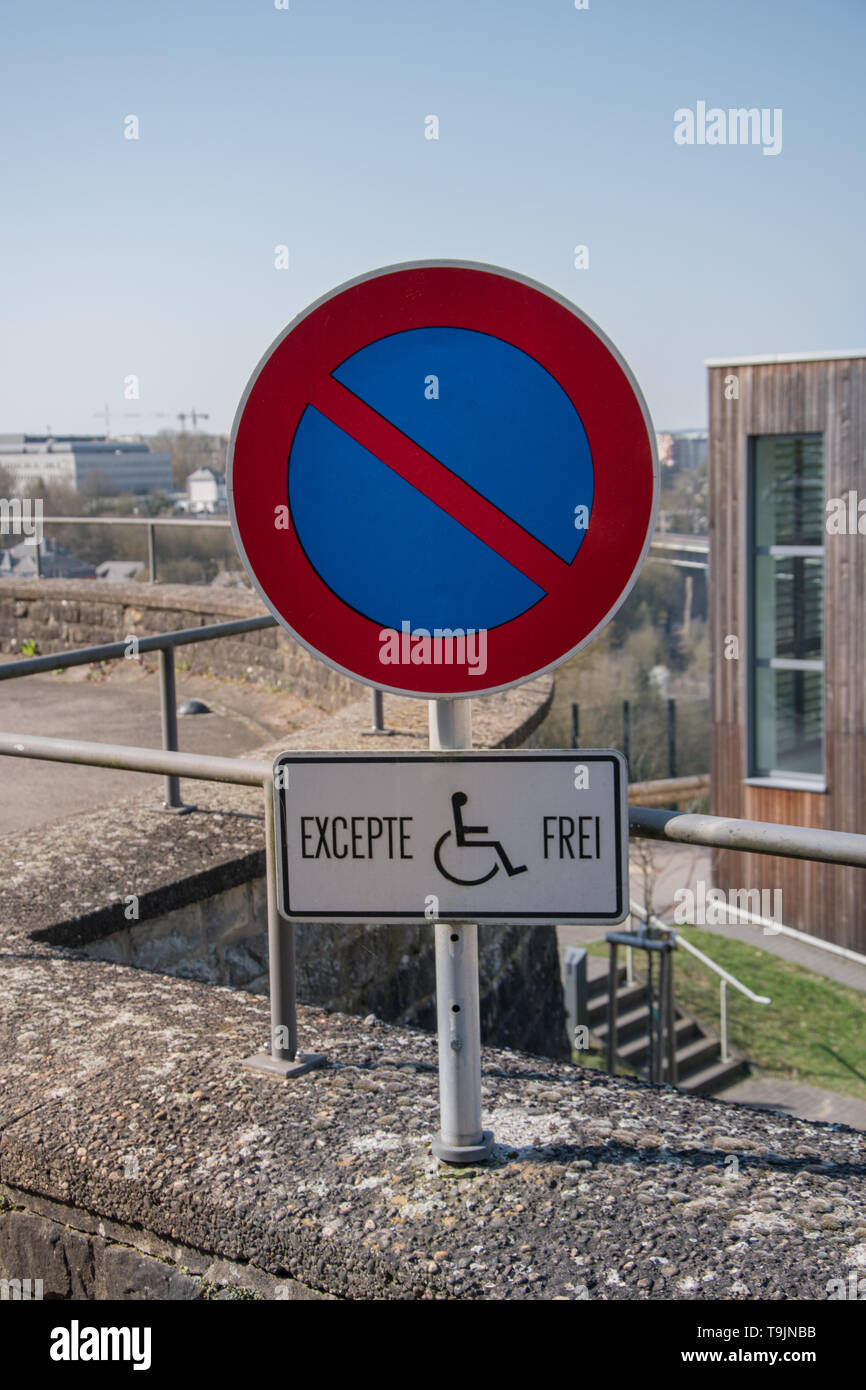 Car parking for people with disabilities. Disabled parking place Stock