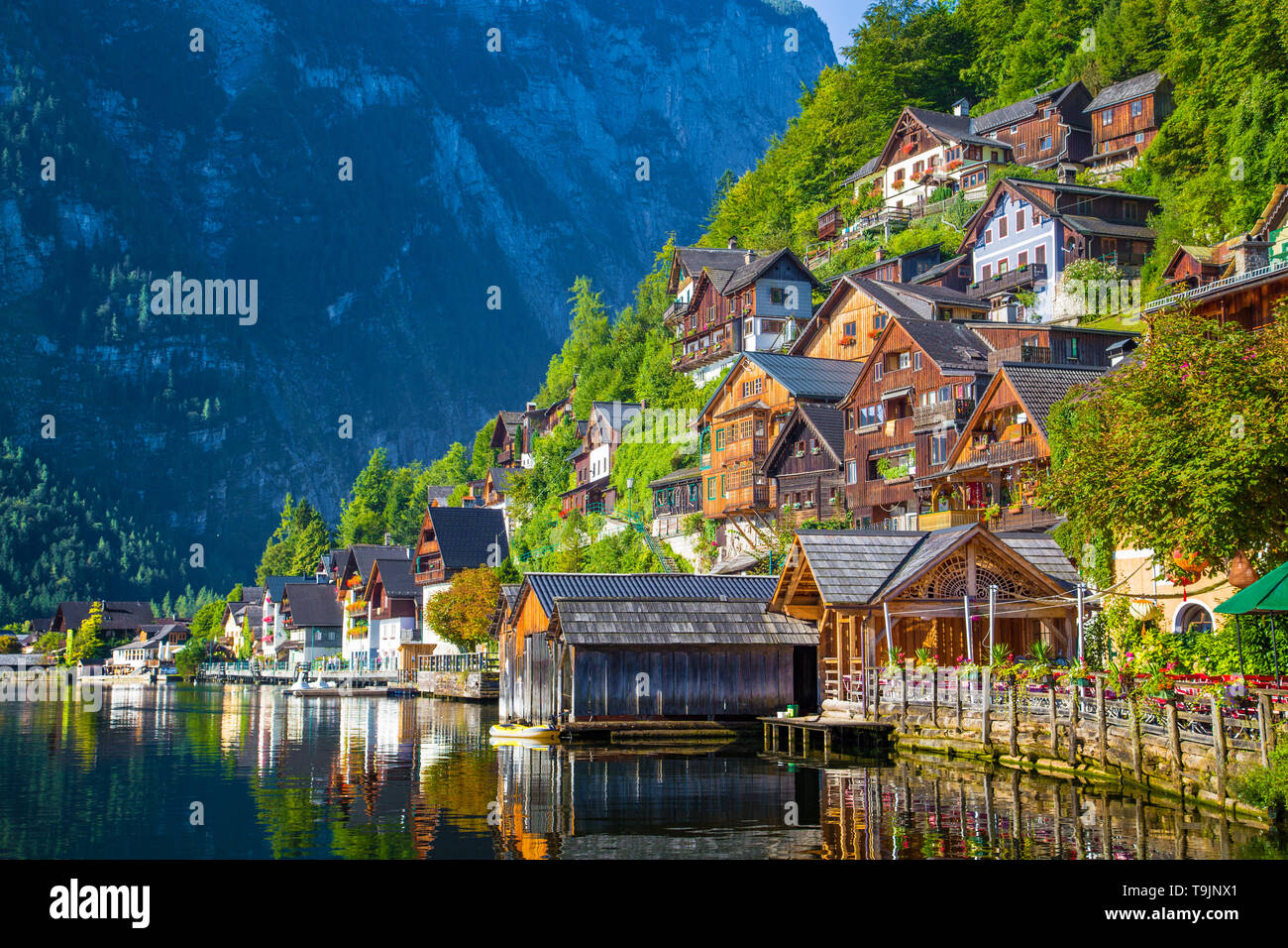 Traditional old wooden houses in famous Hallstatt mountain village at Hallstattersee lake in the Austrian Alps in summer, region of Salzkammergut, Aus Stock Photo