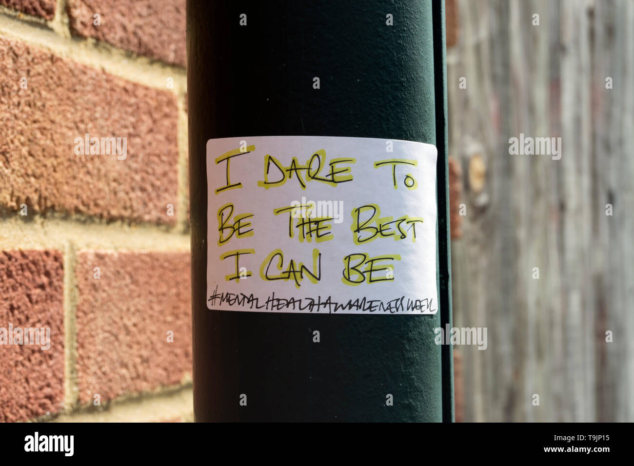i dare to be the best i can be, a sticker attached to a lamppost in barnes, london, england, with a mental health awareness week hashtag Stock Photo