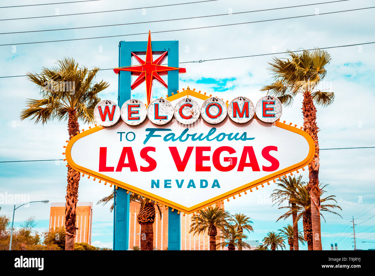 Classic view of Welcome to Fabulous Las Vegas sign at the south end of world famous Las Vegas strip on a beautiful sunny day with blue sky and clouds Stock Photo