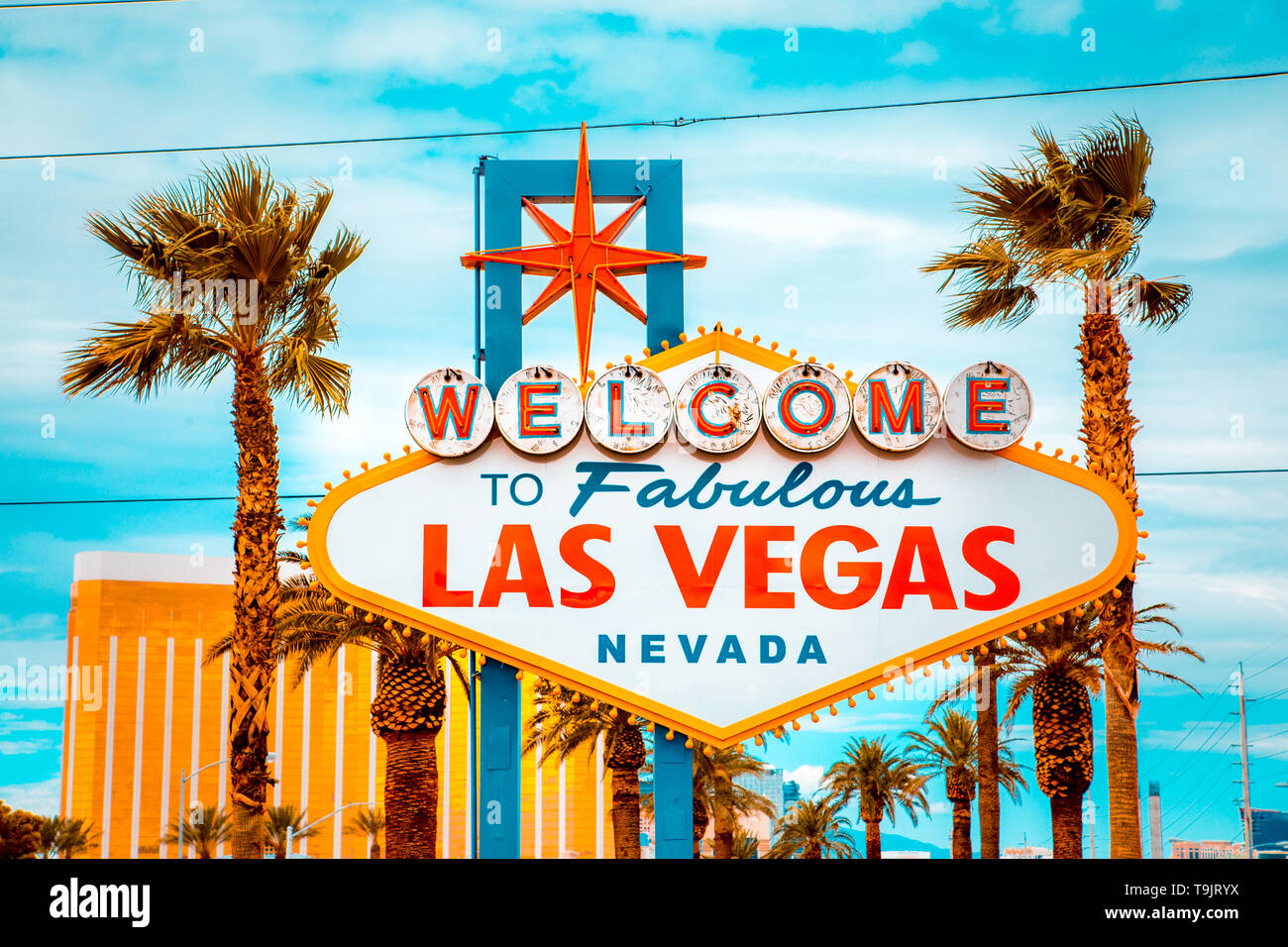 Classic view of Welcome to Fabulous Las Vegas sign at the south end of world famous Las Vegas strip on a beautiful sunny day with blue sky and clouds Stock Photo