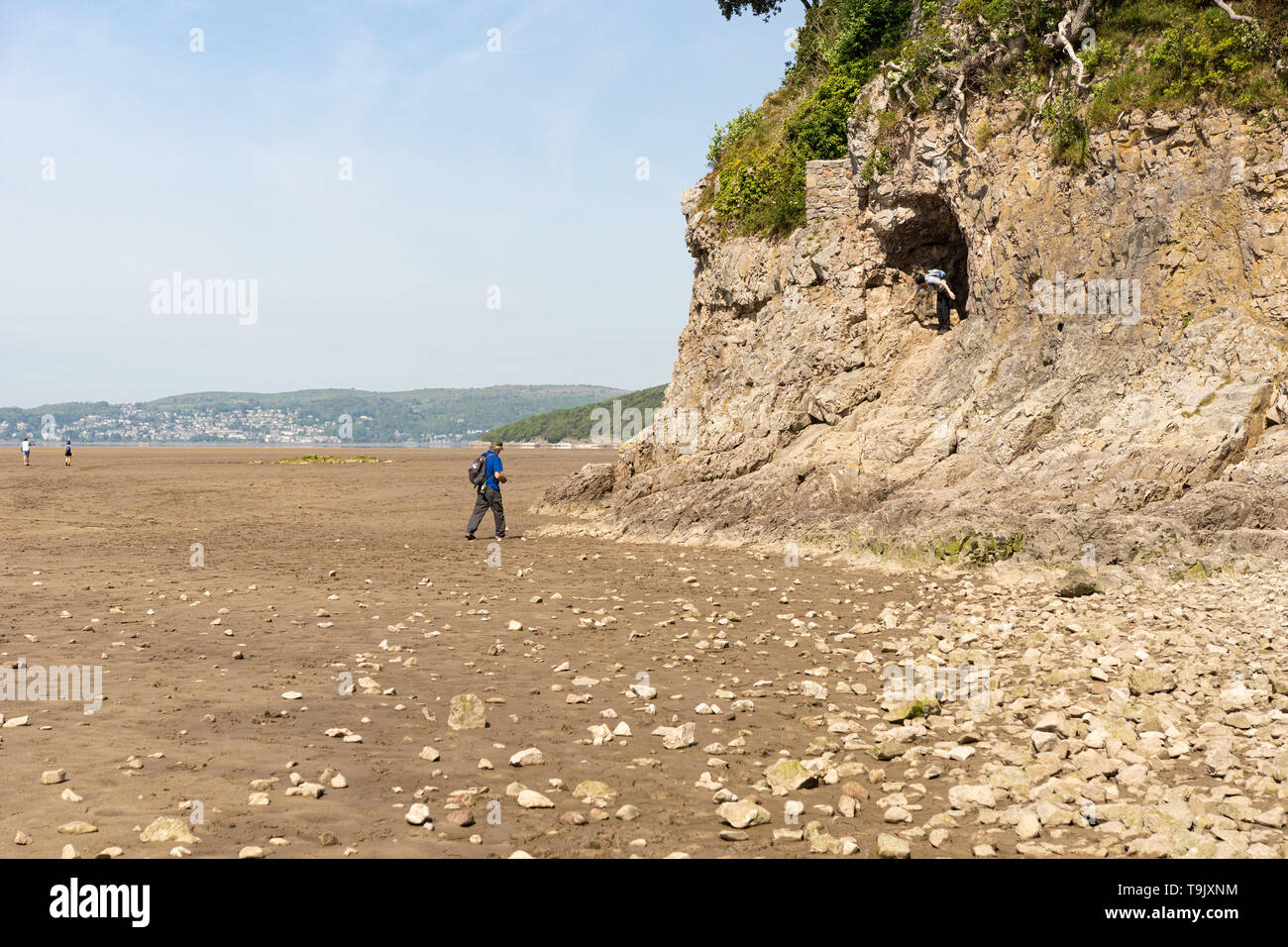couple exploring the cave at the cove well in Silverdale, Lancashire.uk Stock Photo Alamy