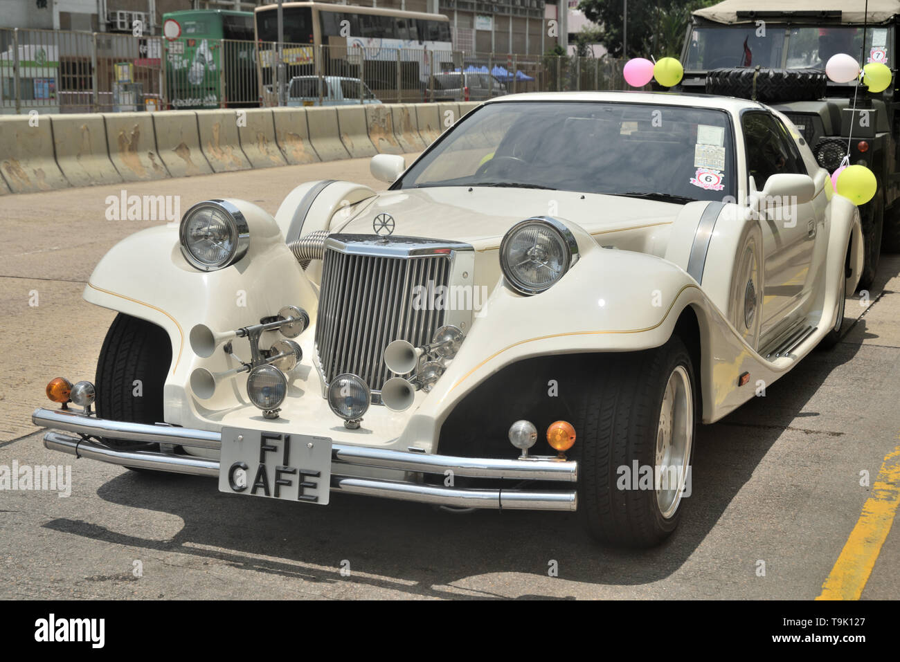 White Mitsuoka Le Seyde coupe shows up in an outdoor event, Hong Kong Stock Photo