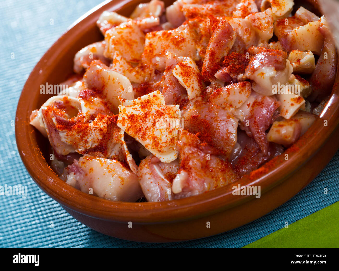 Spanish dish roasted pig ears Stock Photo Alamy