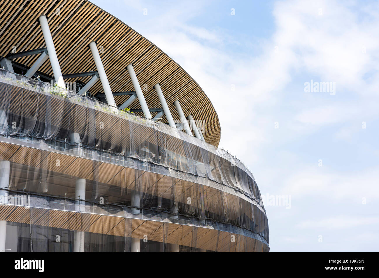 Construction Site Of New National Stadium In Tokyo. Japan Is Preparing For New Olympic Games. Tree Arrangement On The Facade Of Building. Stock Photo