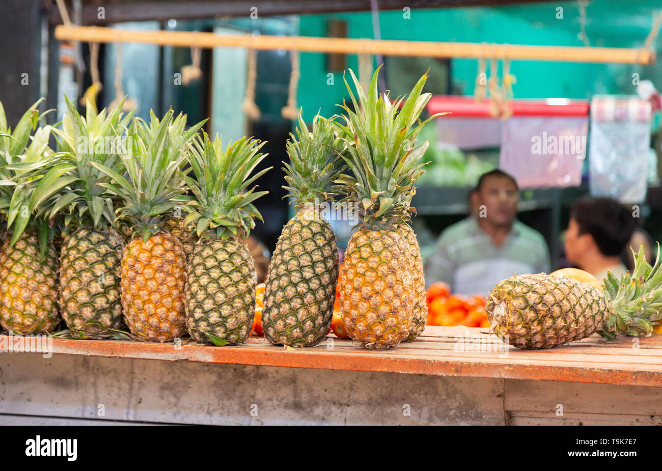 Latin american market - pineapples for sale at a food market, Merida, Yucatan Mexico Latin America Stock Photo