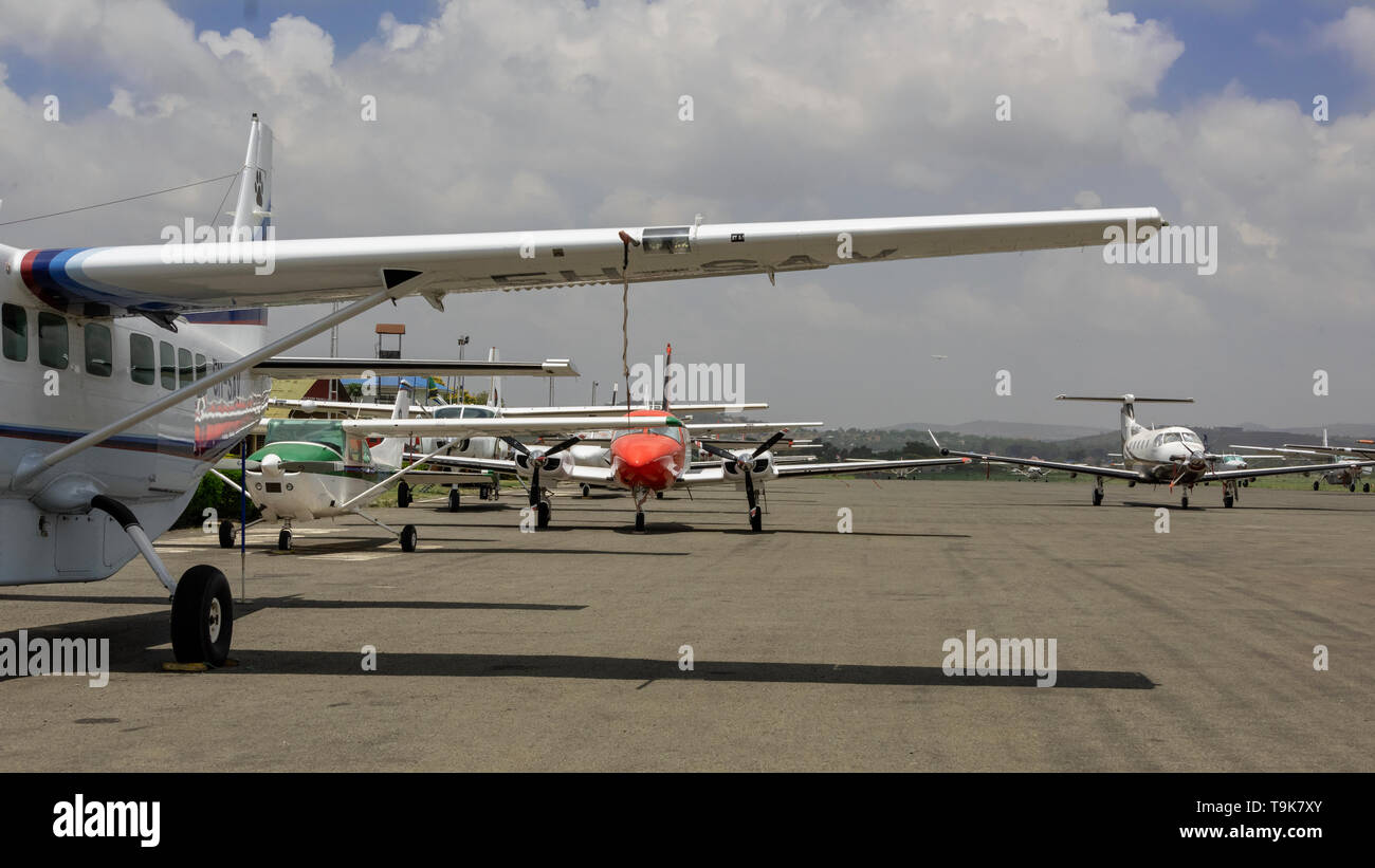 Safari planes gathered on the runway at Arusha Airport, Tanzania Stock Photo
