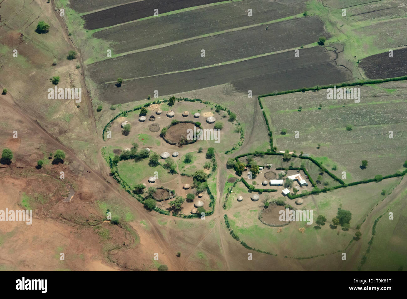 Bomas and fields, Mondli region west of Arusha, Tanzania Stock Photo