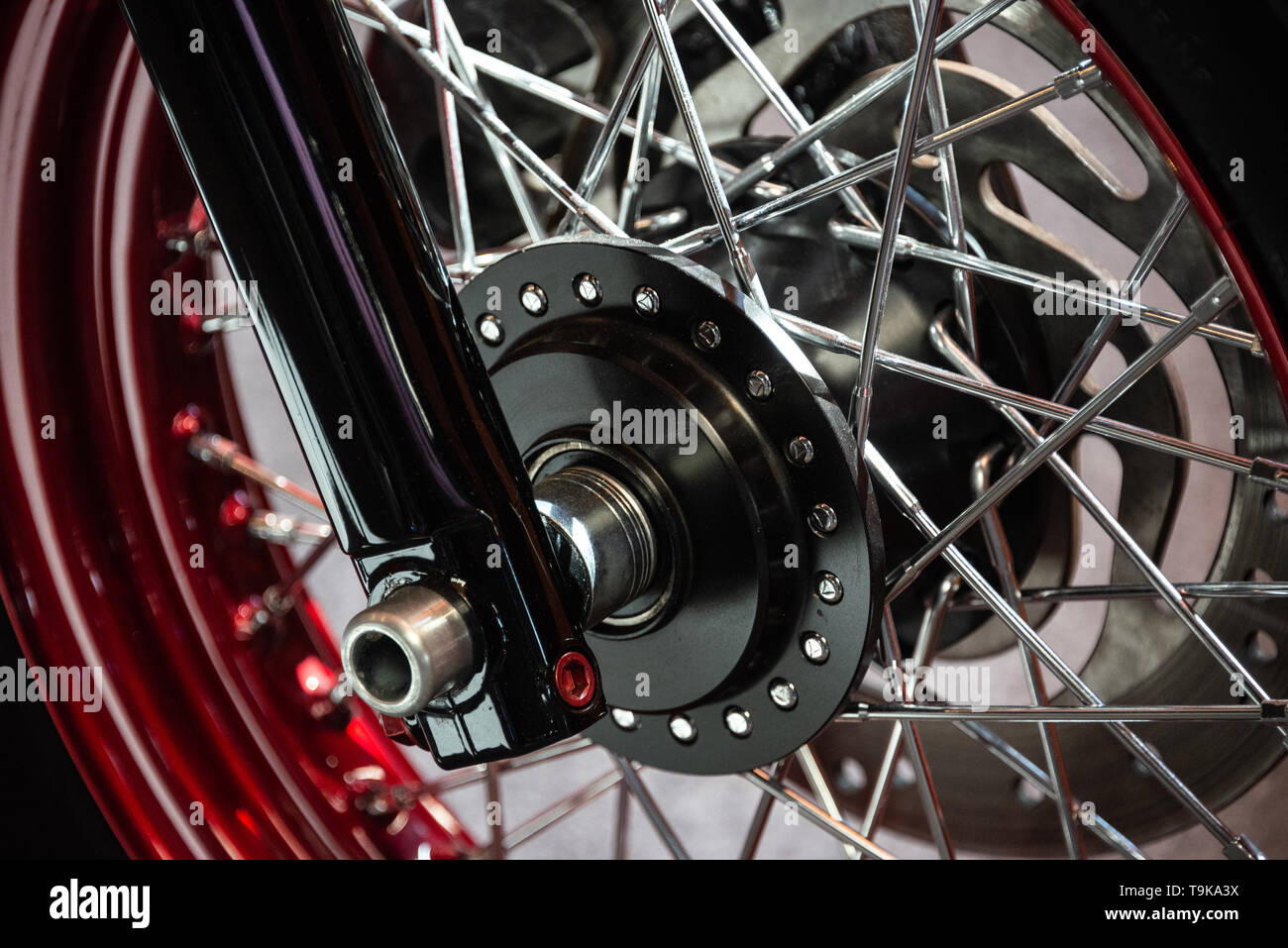 black motorcycle red wheels