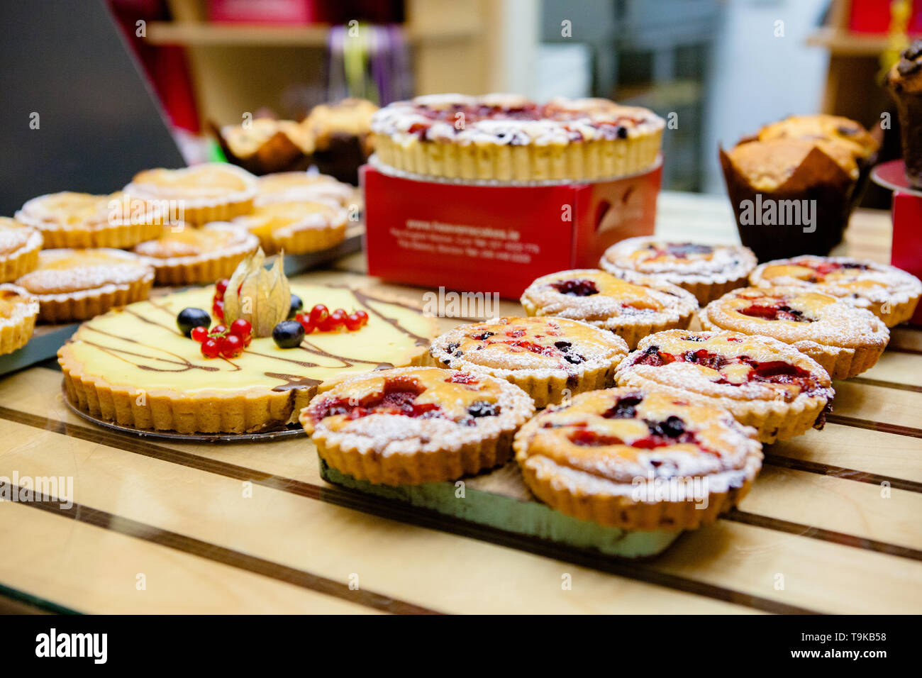 Various Different Types Of Sweet Cakes In Pastry Shop Stock Photo