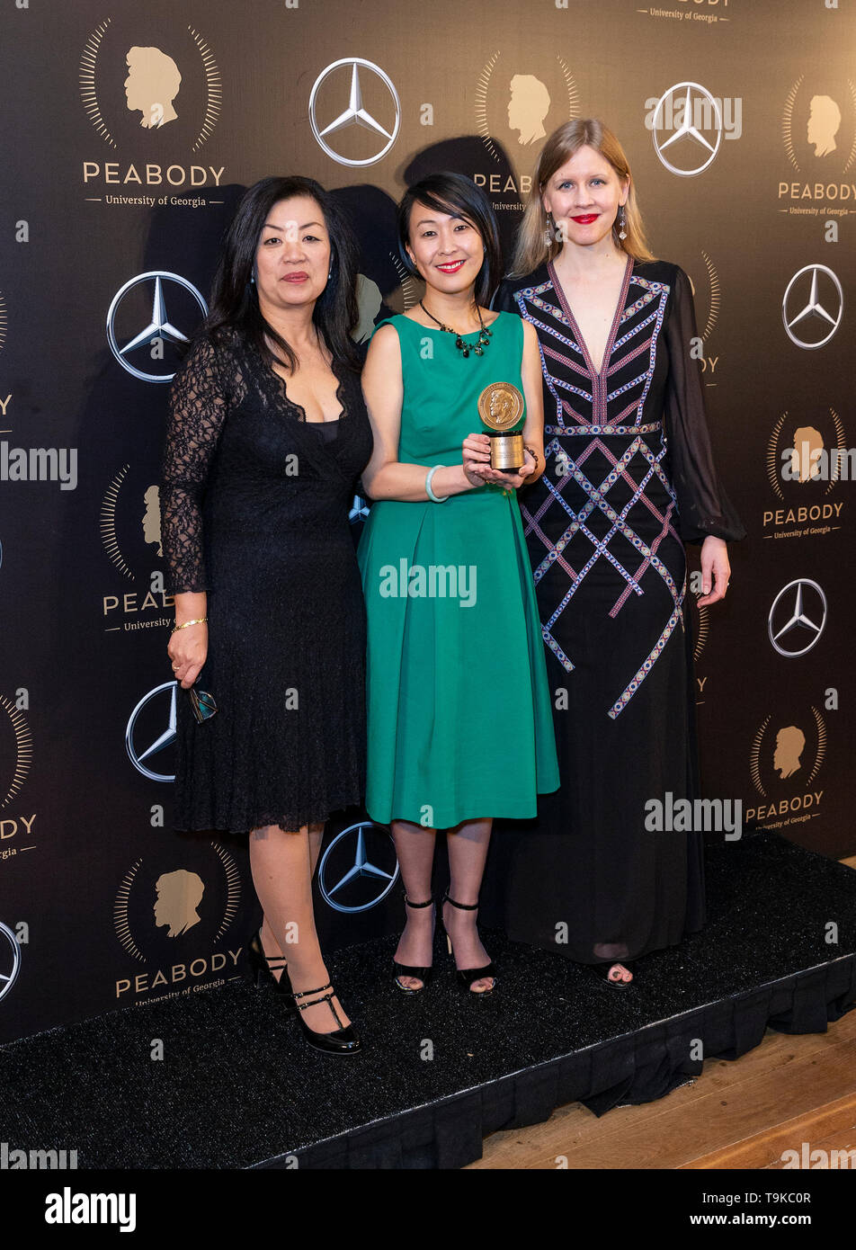 New York, United States. 18th May, 2019. Anita Lee, Tiffany Hsiung and  Justine Nagan pose in the press room of 78th Annual Peabody Awards Ceremony  at Cipriani Wall Street Credit: Lev Radin/Pacific