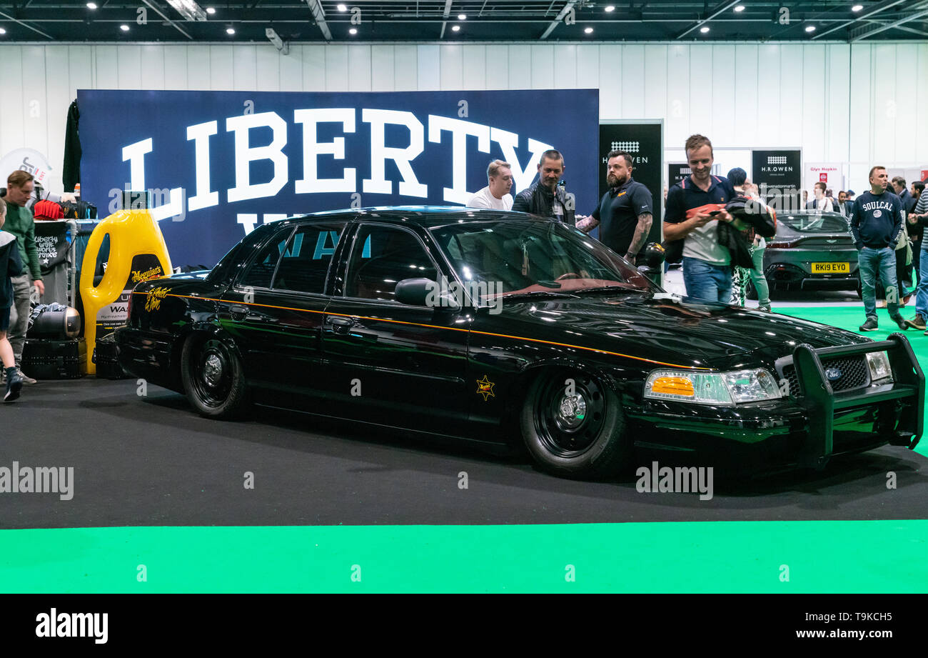 18th May 2019. London, UK. Black lowered iconic American Police interceptor car Ford Crown Victoria at London Motor Show 2019. Stock Photo
