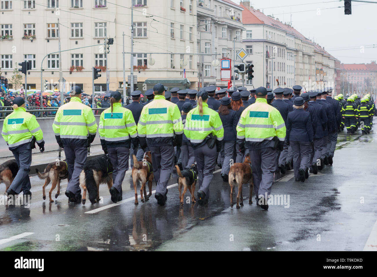 Customs officers with service dogs are marching on military parade  in Prague, Czech Republic Stock Photo