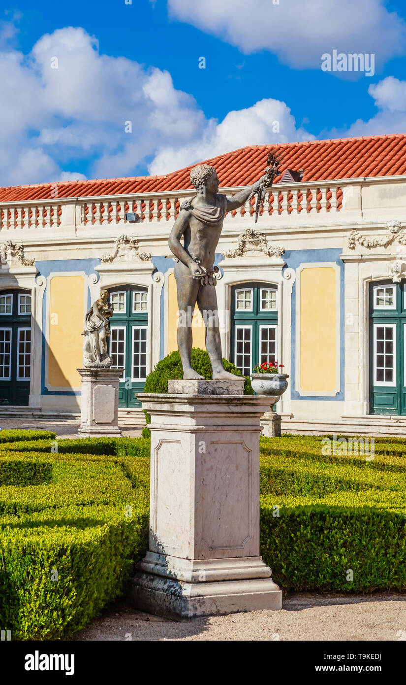 The gardens of the royal residence of Palacio de Queluz surrounded by sculptures and statues Lisbon Portugal Stock Photo