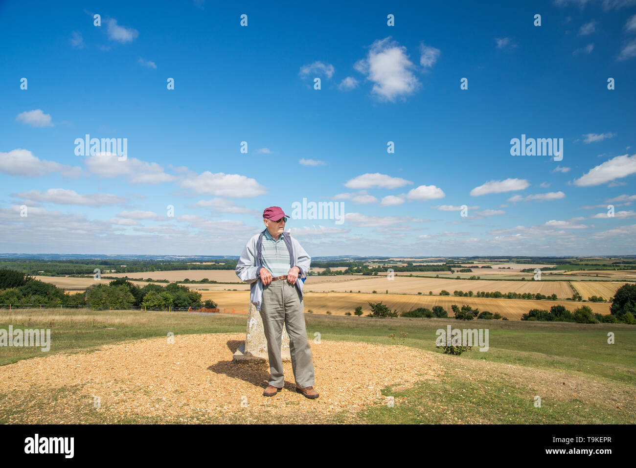 90 year old man takes his wife,who has severe sight loss to the countryside in Wiltshire to get her out in nature and away from their house. Stock Photo