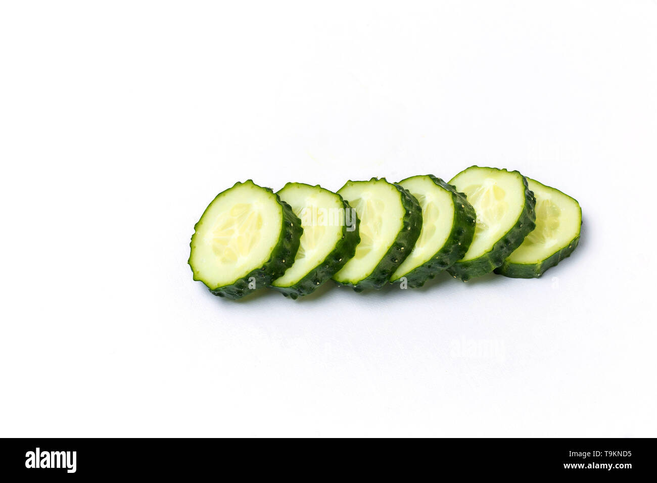 Sliced cucumber, slices on white background, isolate Stock Photo