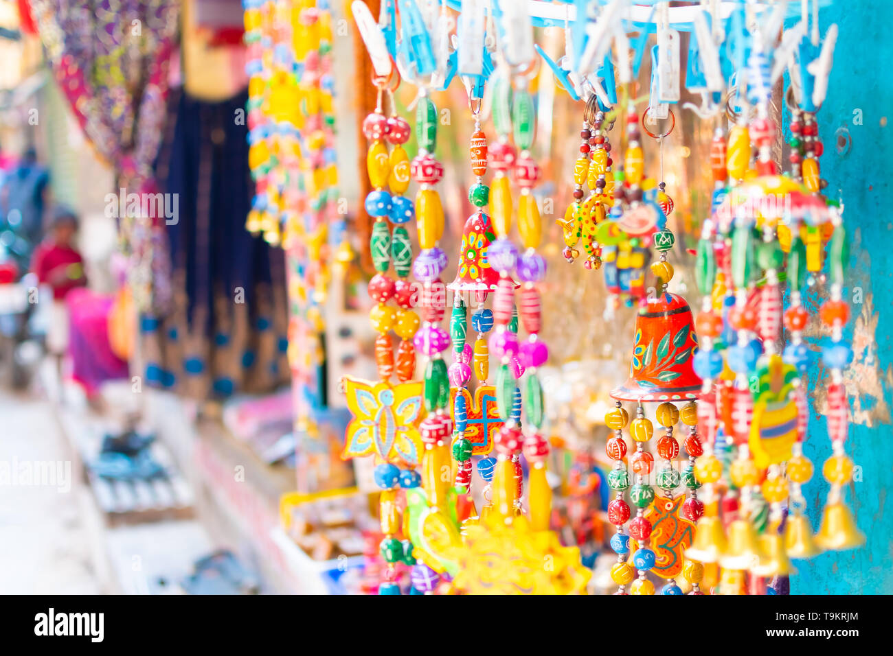 Small bells are hanging at the souvenir shop in Varanasi with a