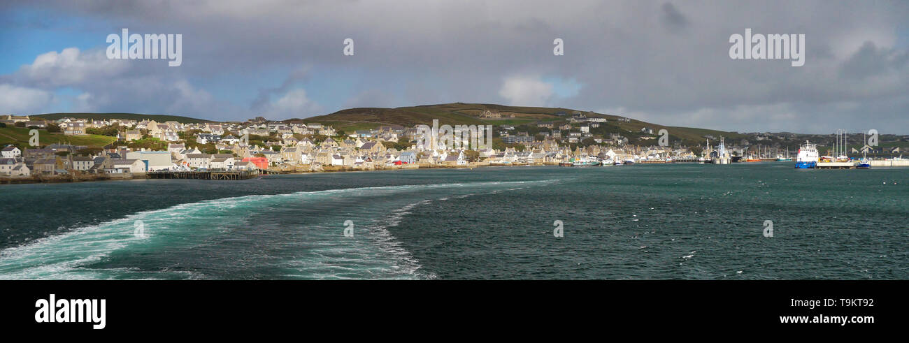 The port town of Stromness in Orkney, Scotland, UK, from the departing ferry to Scrabster Stock Photo