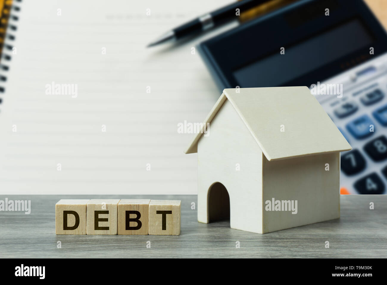 Concept liabilities related to real estate. A small residential house