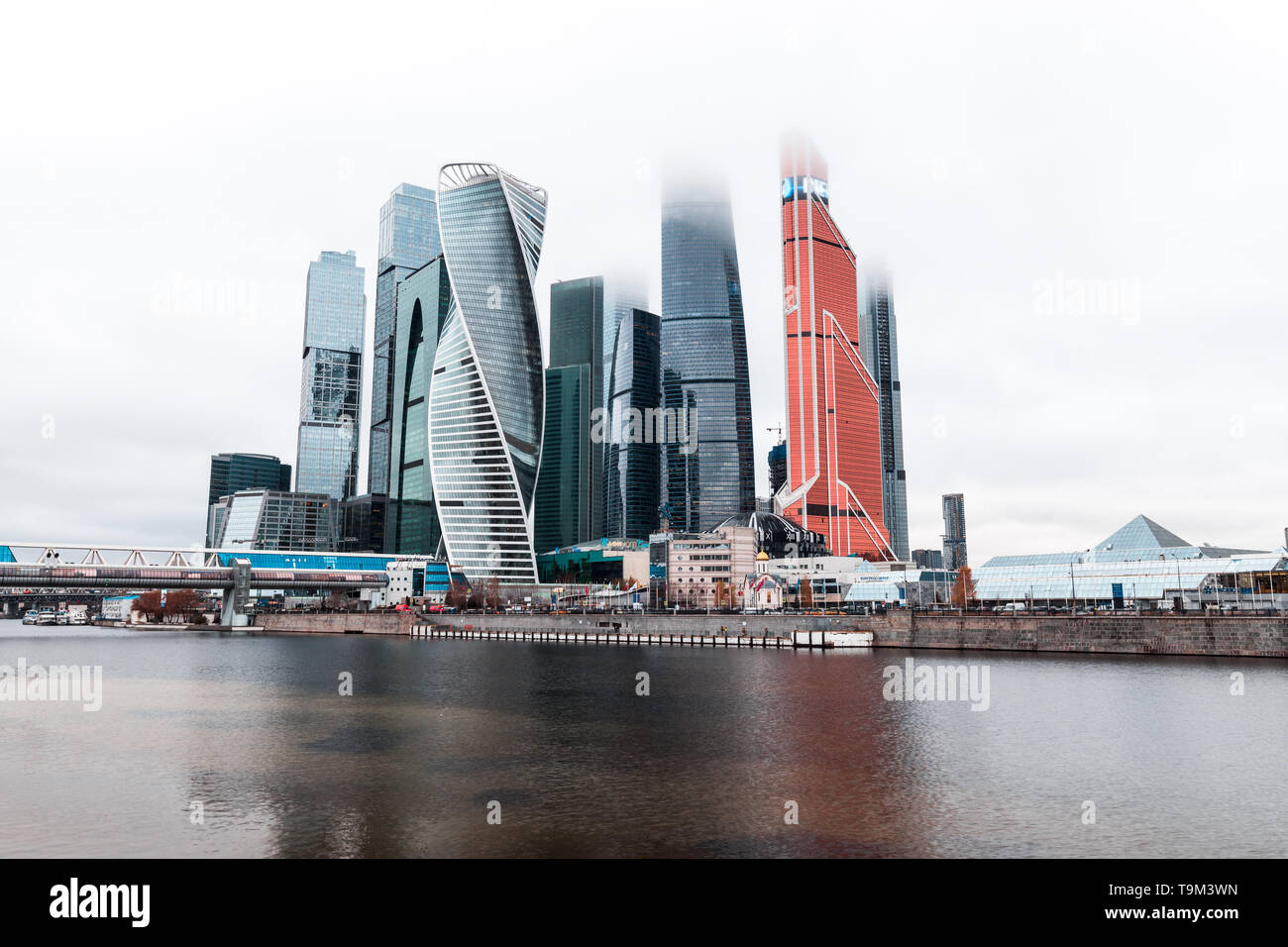 Fogcovered skyscrapers of Moskva City (MIBC) next to river Moscva