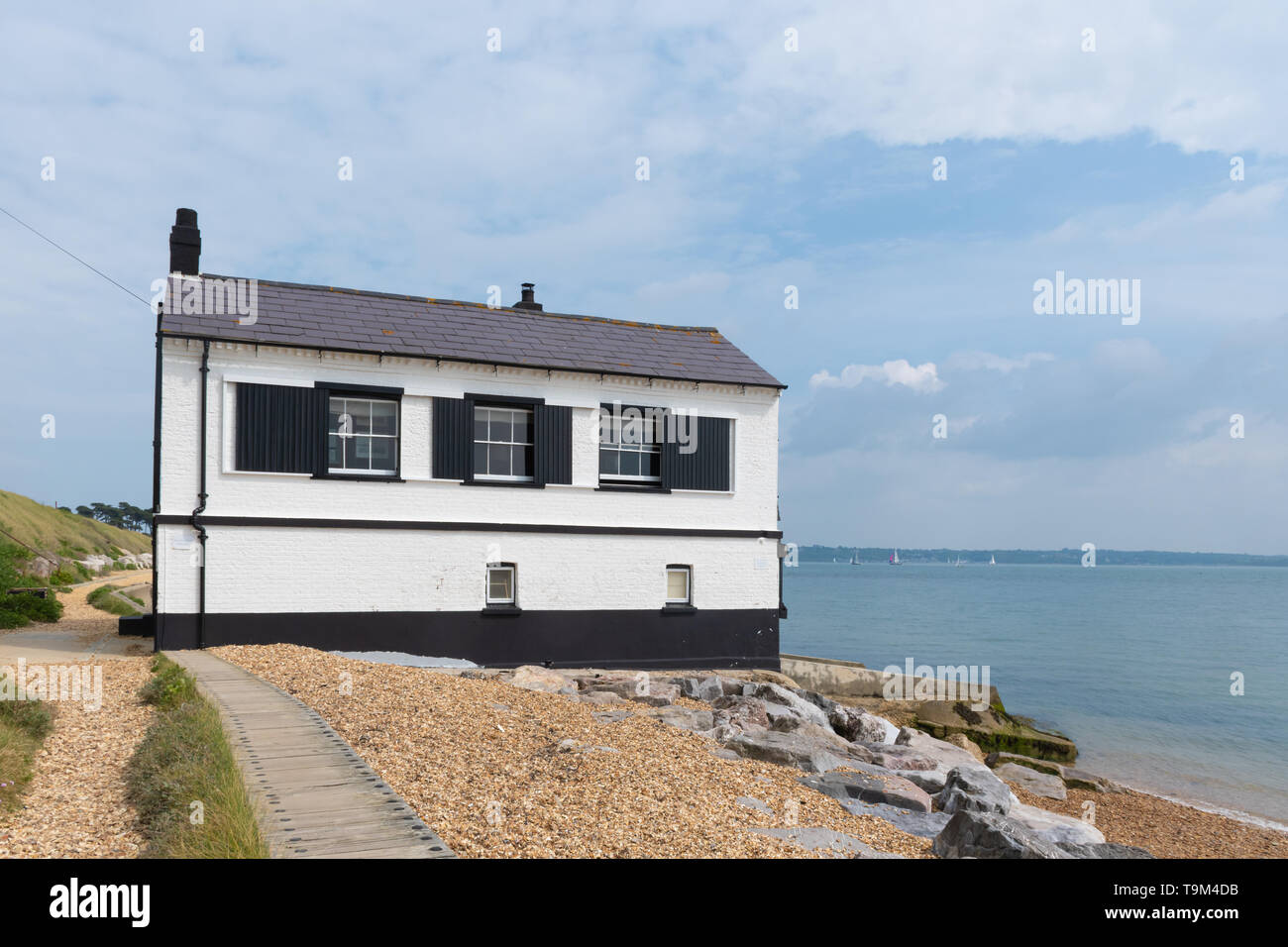 The Watch House built by the coastguard, completed in 1828, on Lepe Beach on the south coast of Hampshire, UK Stock Photo