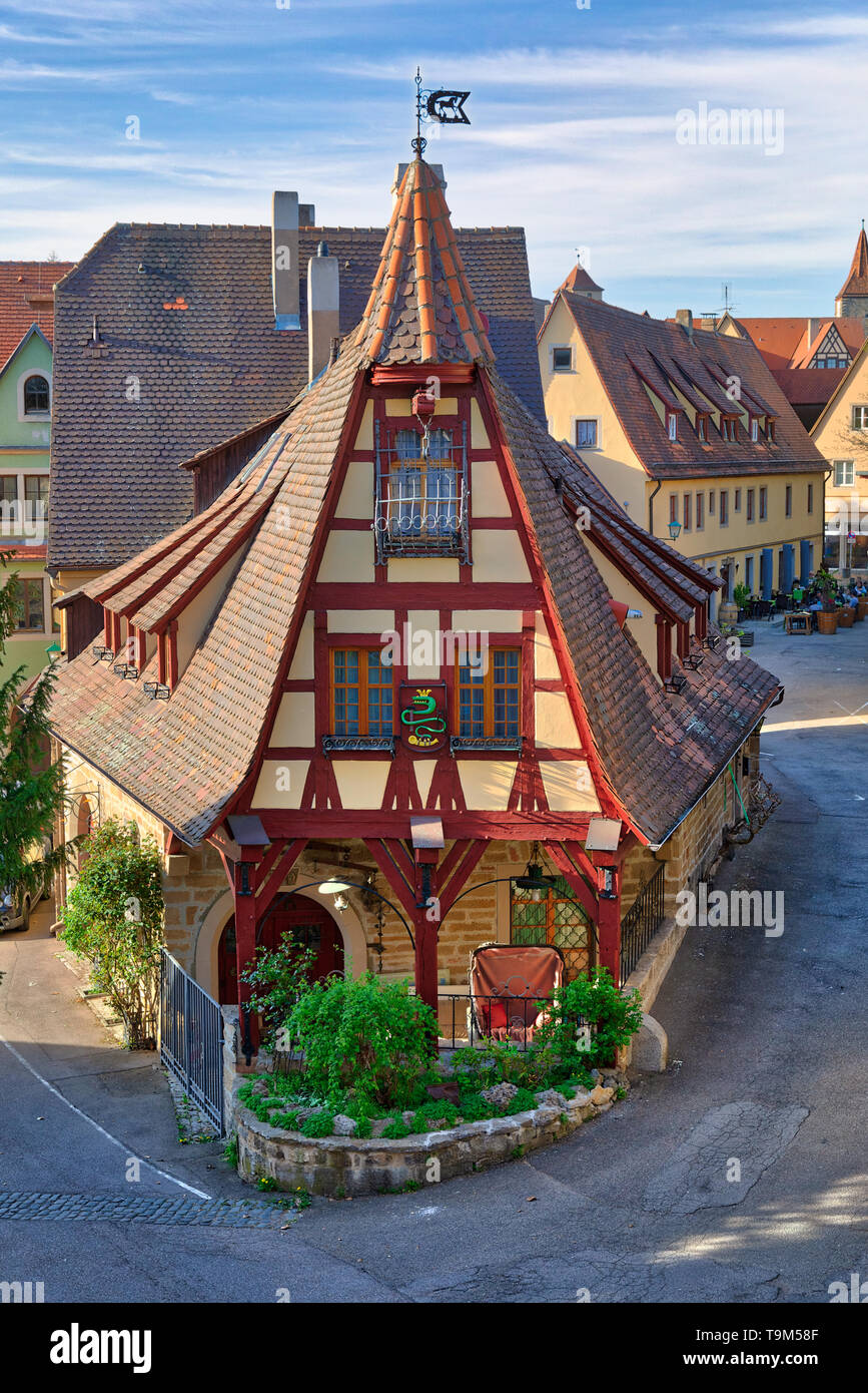 Beautiful view of the historic Gerlach Blacksmith shop and the Roeder Gate Tower in the medieval town Rothenburg ob der Taube on a sunny day, Bavaria, Stock Photo