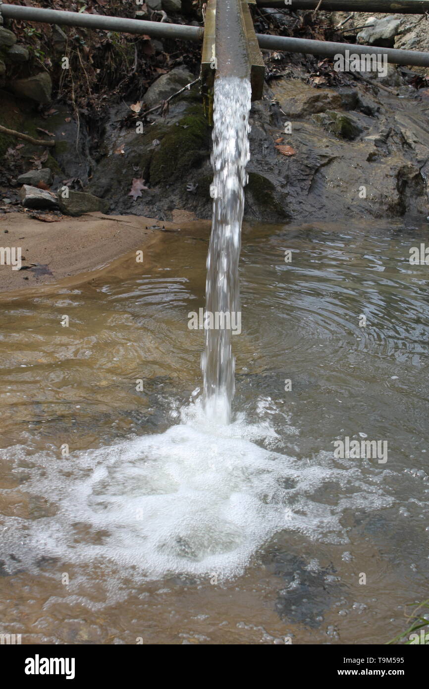 water flowing out of a pipe Stock Photo Alamy