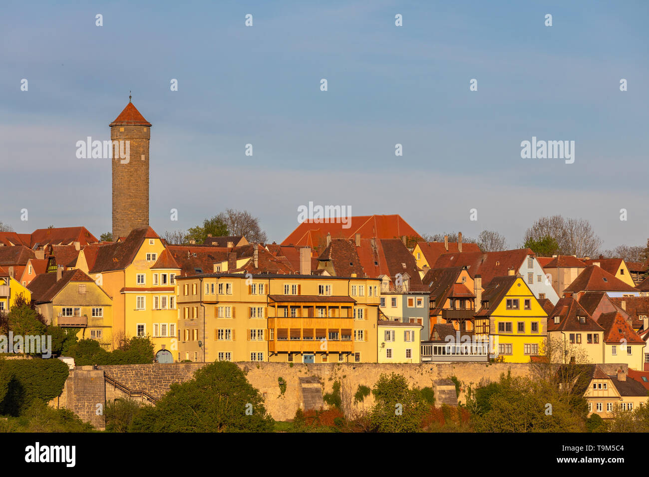 Beautiful view of the medieval town Rothenburg ob der Taube and the river valley from the castle garten at sunset, Bavaria, Germany Stock Photo