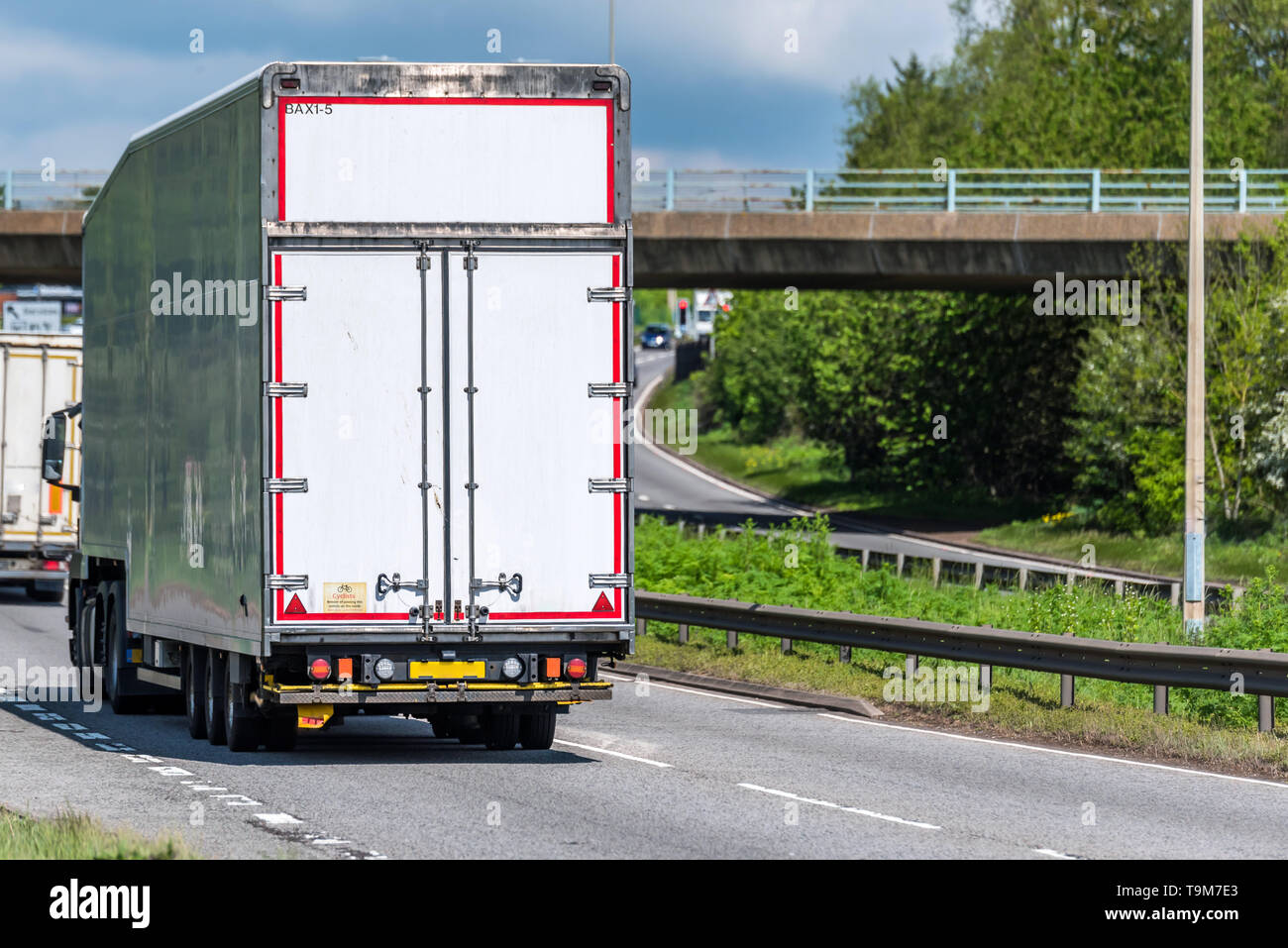 white box lorry truck on uk motorway in fast motion Stock Photo Alamy
