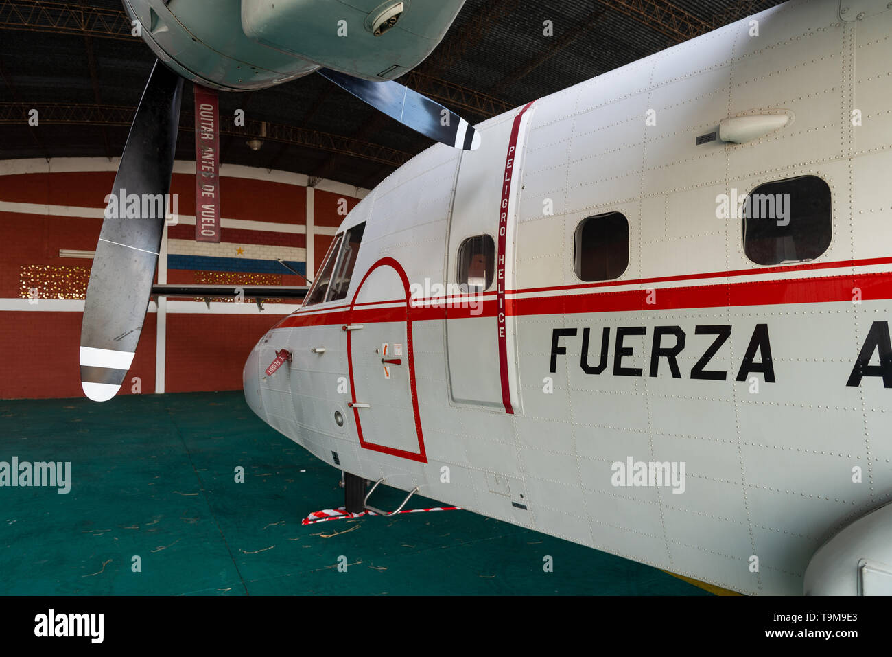 Light cargo plane CASA C-212 from Airbus Group SE in the hangar of Fuerza Aerea Paraguaya, Paraguay Stock Photo