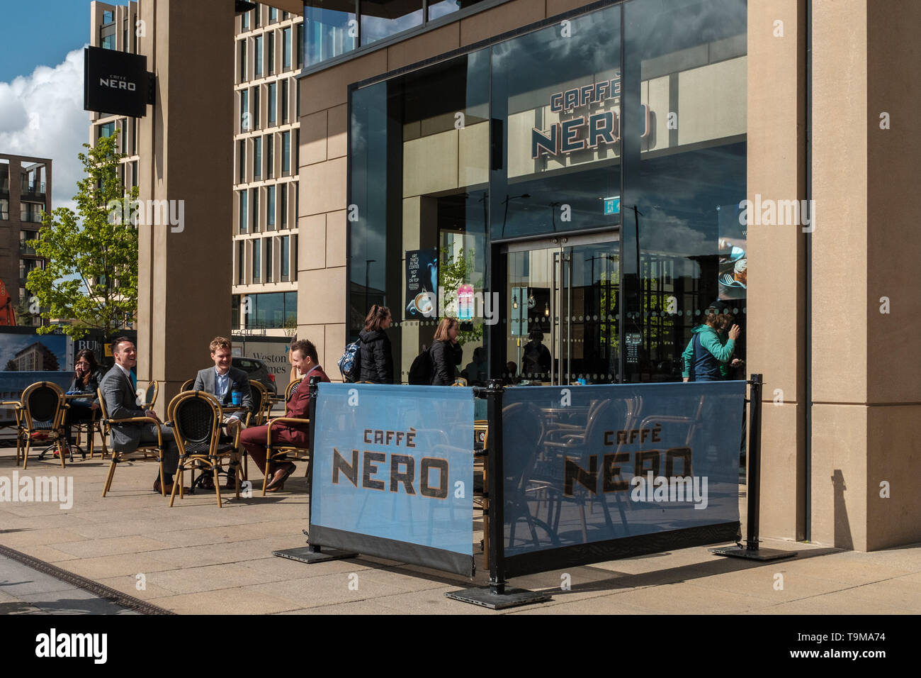 Customers outside a branch of Caffe Nero Stock Photo