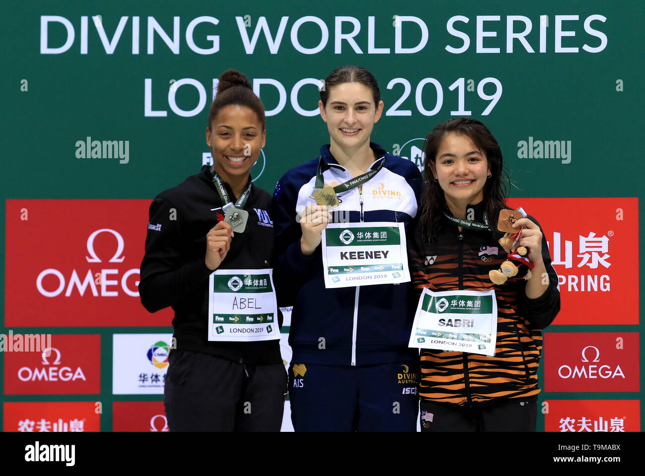 Australia's Maddison Keeney poses with her gold medal after winning the women's 3m springboard alongside Canada's Jennifer Abel and Malaysia's Nur Ddhabitah Binti Sabri during day three of the Diving World Series at London Aquatics Centre, London. Stock Photo