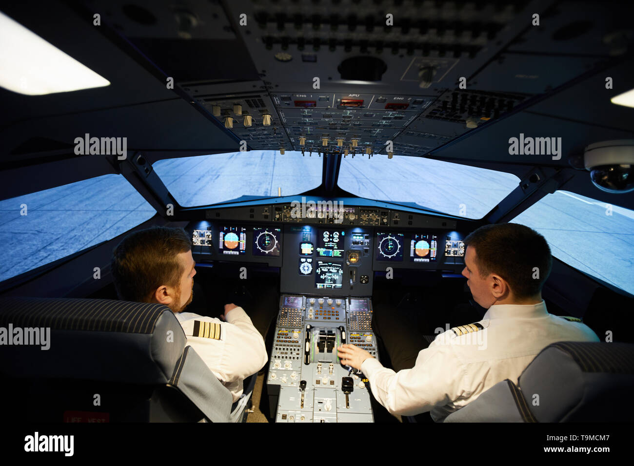 Flight deck uniform hi-res stock photography and images - Alamy