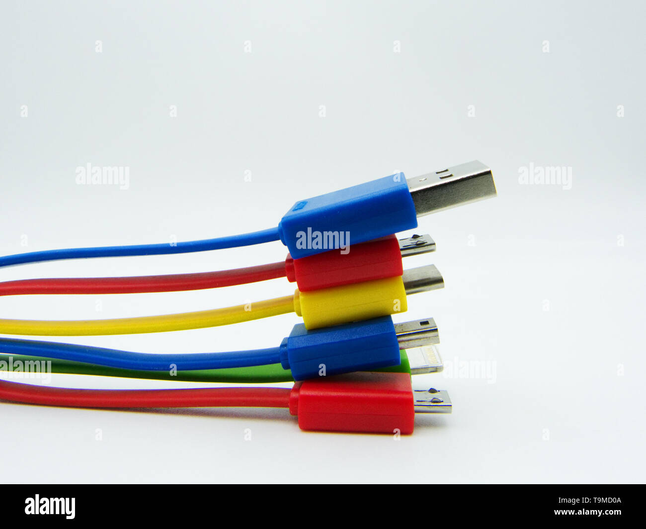 Diferent cables for computer and electronic devices on white background Stock Photo