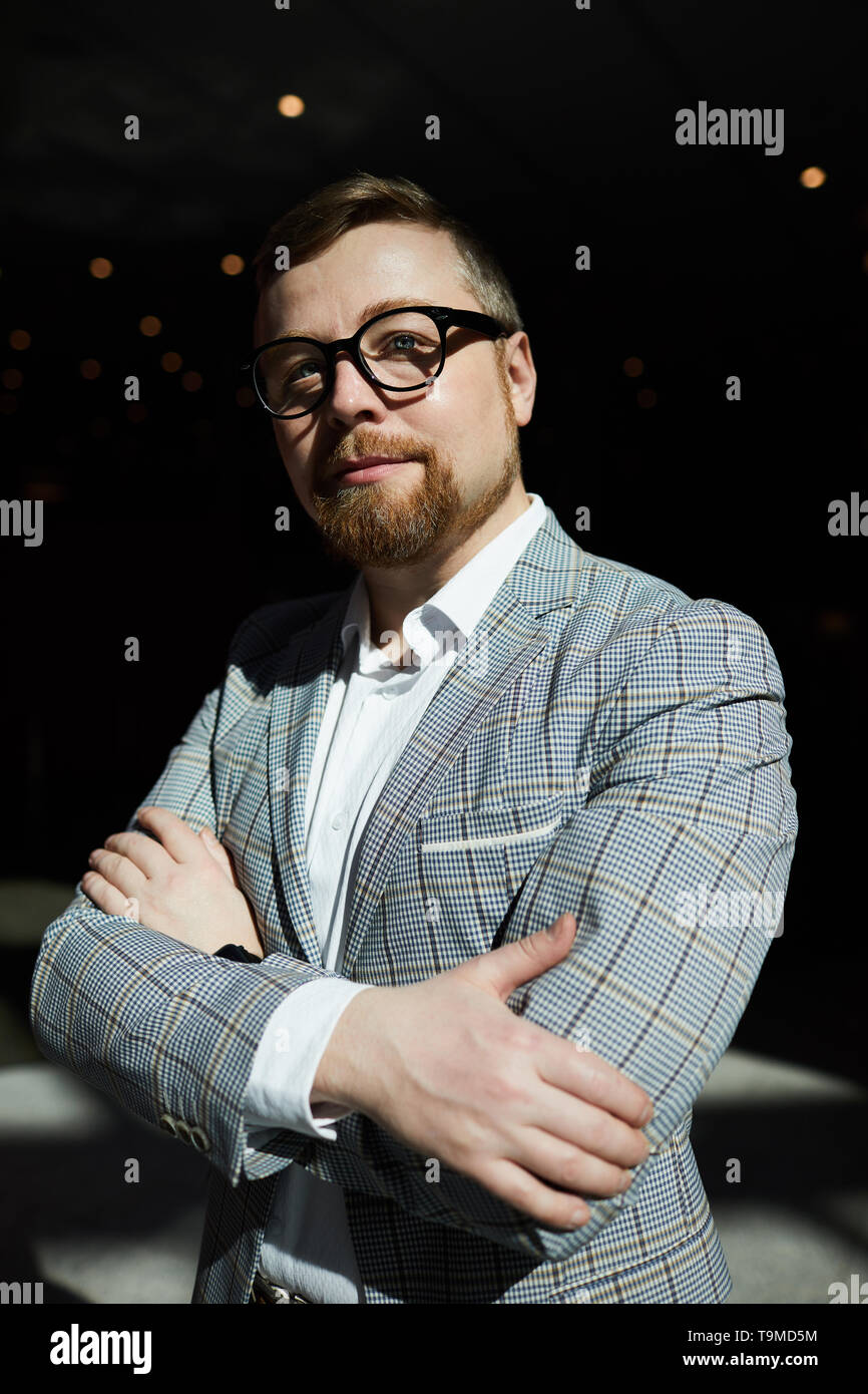 Successful bearded man on stage Stock Photo