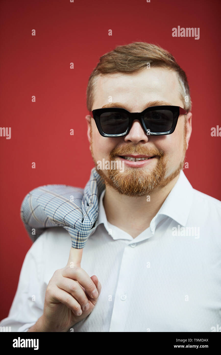 Smiling bearded man in sunglasses Stock Photo